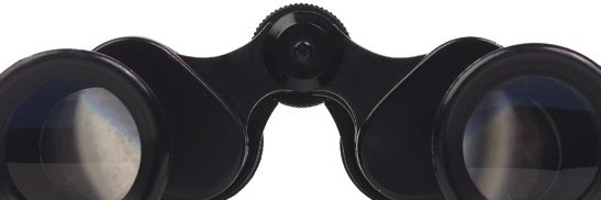 Black binoculars against a white background
