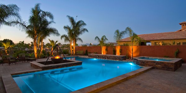 Scottsdale-based Hydroscapes' Roger and Sheri Soares recently finished a diving pool with travertine coping, copper spillways and other water features.