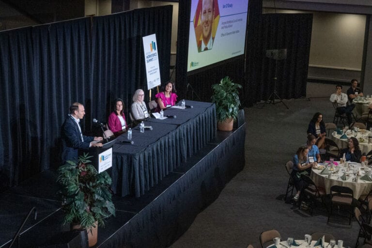 A panel moderated by Ian OGrady with speakers Jennifer Mellor, Jenna Rowell and Karla Morales (left to right) discuss workforce trends across Arizona