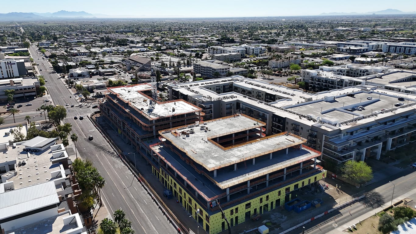 Empire Group and Brinkmann Constructors top out construction on The Monroe