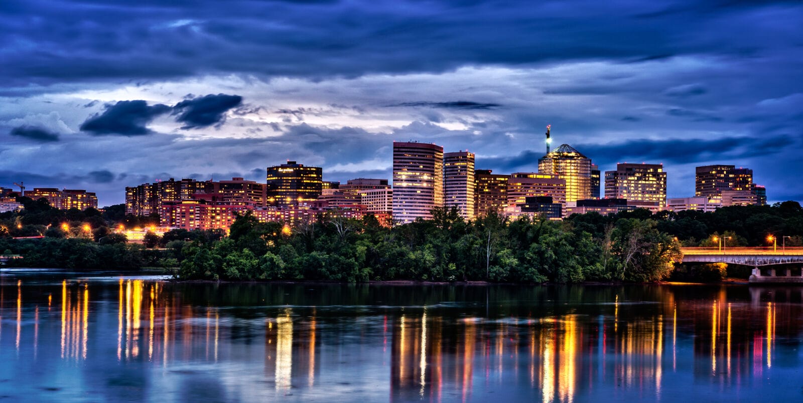Arlington, Virginia, downtown city skyline at dusk on the Potomac River.