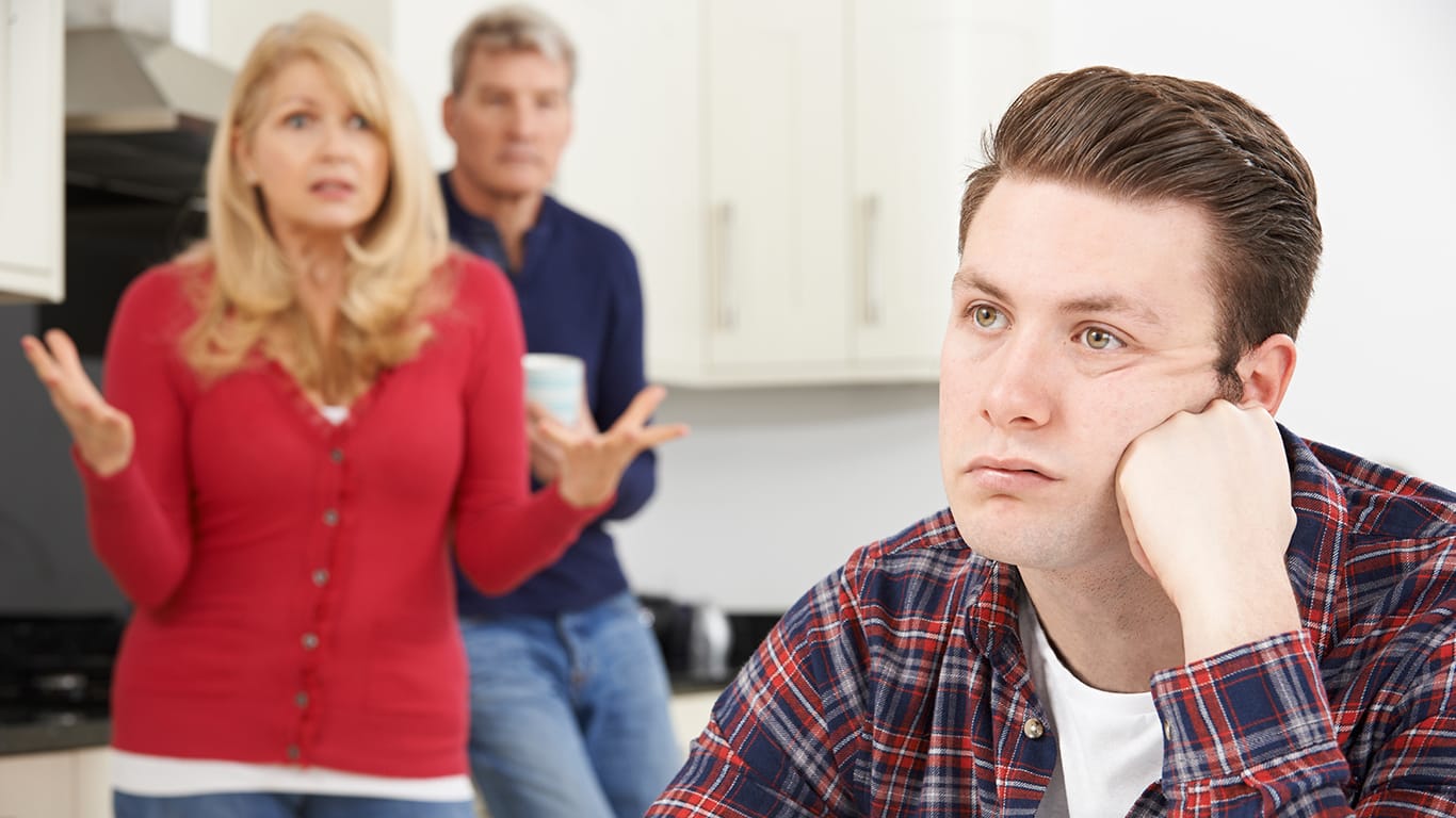 Mature Parents Frustrated With Adult Son Living At Home.