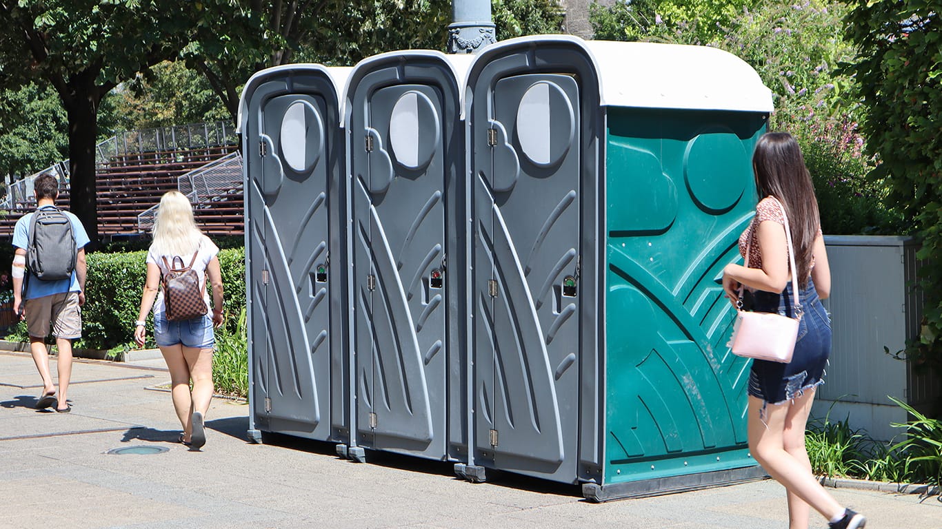 Portable restrooms on the street.