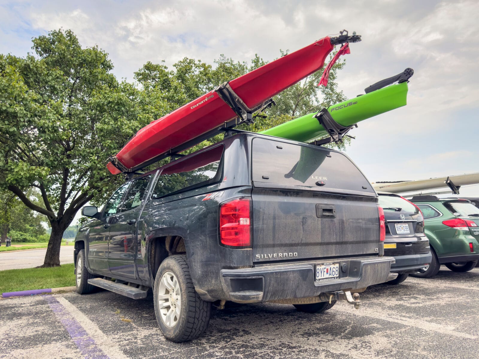 Pickup truck cap providing secure storage for work and recreation.